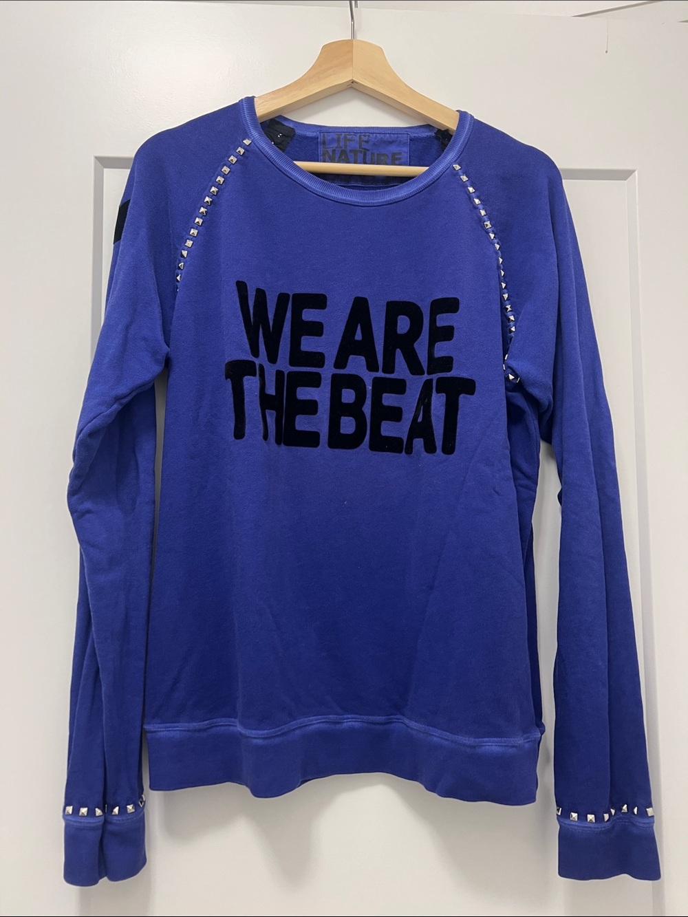 freecity purple  Studded "WE ARE THE BEAT" Sweatshirt